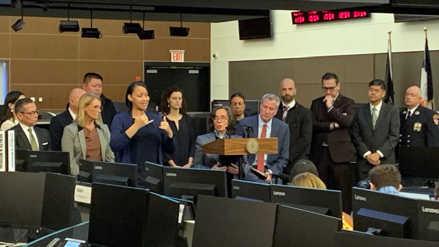 Commissioner Barbot speaks at Emergency Management headquarters with the mayor and other officicals.