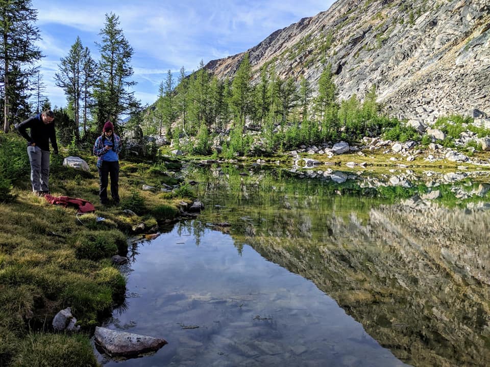BLCoulthard's tweet photo. Settling into my office chair for the semester, dreaming of field days. Here: MS students @Ingaedulisk &amp; Laura Dye pump water for breakfast, deep in the Pintlers Wilderness Area, MT, 2019.
#HYTRACLab #WomenInSTEM @UNLVresearch @UNLVGeoscience https://t.co/WkVviqQuDM