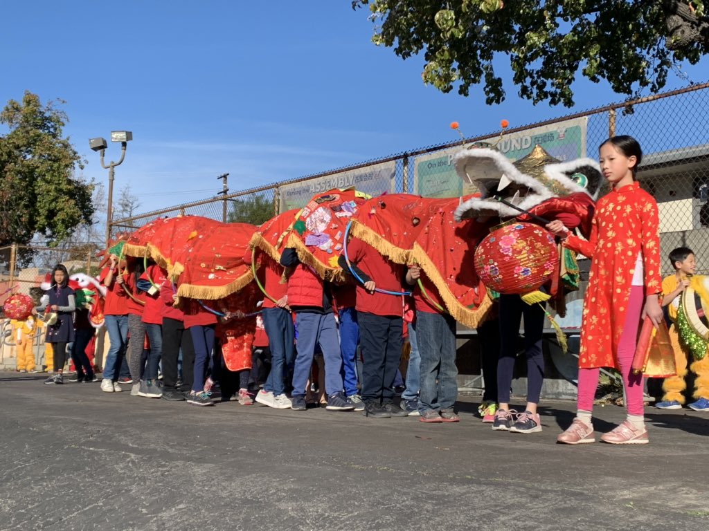 Hchanhill's tweet photo. Xin nian kuai le! Gong hay fat choy! Happy Lunar New Year, everyone. Thank you @PasadenaUnified #FieldES for allowing my kids to reconnect to a heritage that’s spanned immigration across 4 countries (he’s under that dragon somewhere 😂) #DualLanguage #PUSDproud https://t.co/fgcxaRPFhl