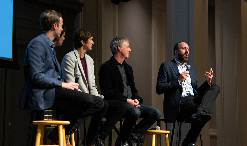 Ryan Calo speaks, seated with four other panelists