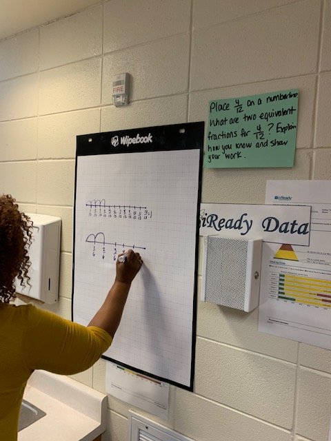 DCSS_Math's tweet photo. In our PL, teachers were able to see how the wipebooks could be used to demonstrate understanding. After working problems, they concluded with a gallery walk providing feedback to each "student" using the language of the standards. #wipebooks https://t.co/N0De3lTa72