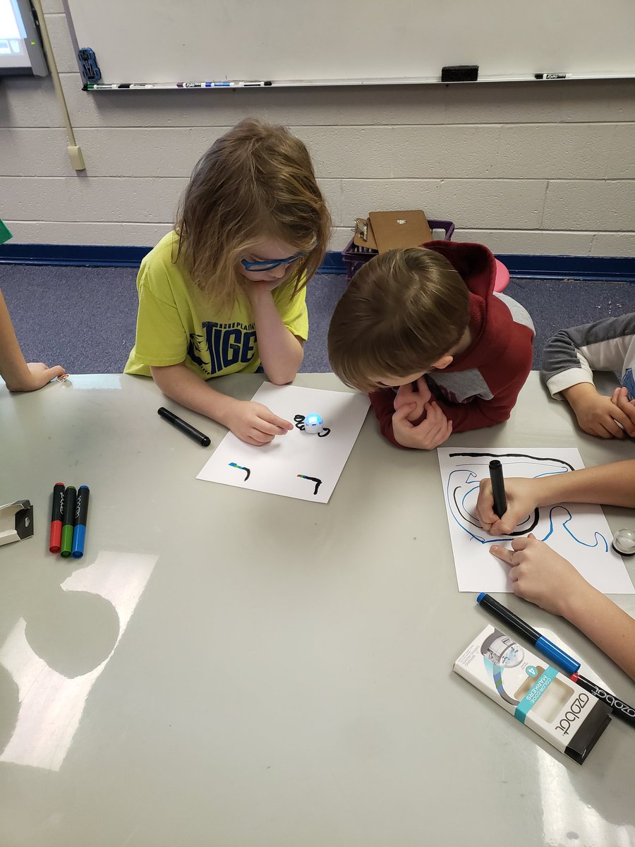 wsmithpes's tweet photo. We had so much fun the last two days teaching our book buddies from @stanaPES class how to code using @Ozobot #plainstigers https://t.co/KOlBGVq5Io