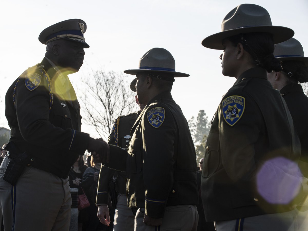 CHP Commissioner Warren Stanley congratulates cadets during an Inspection prior to graduation.