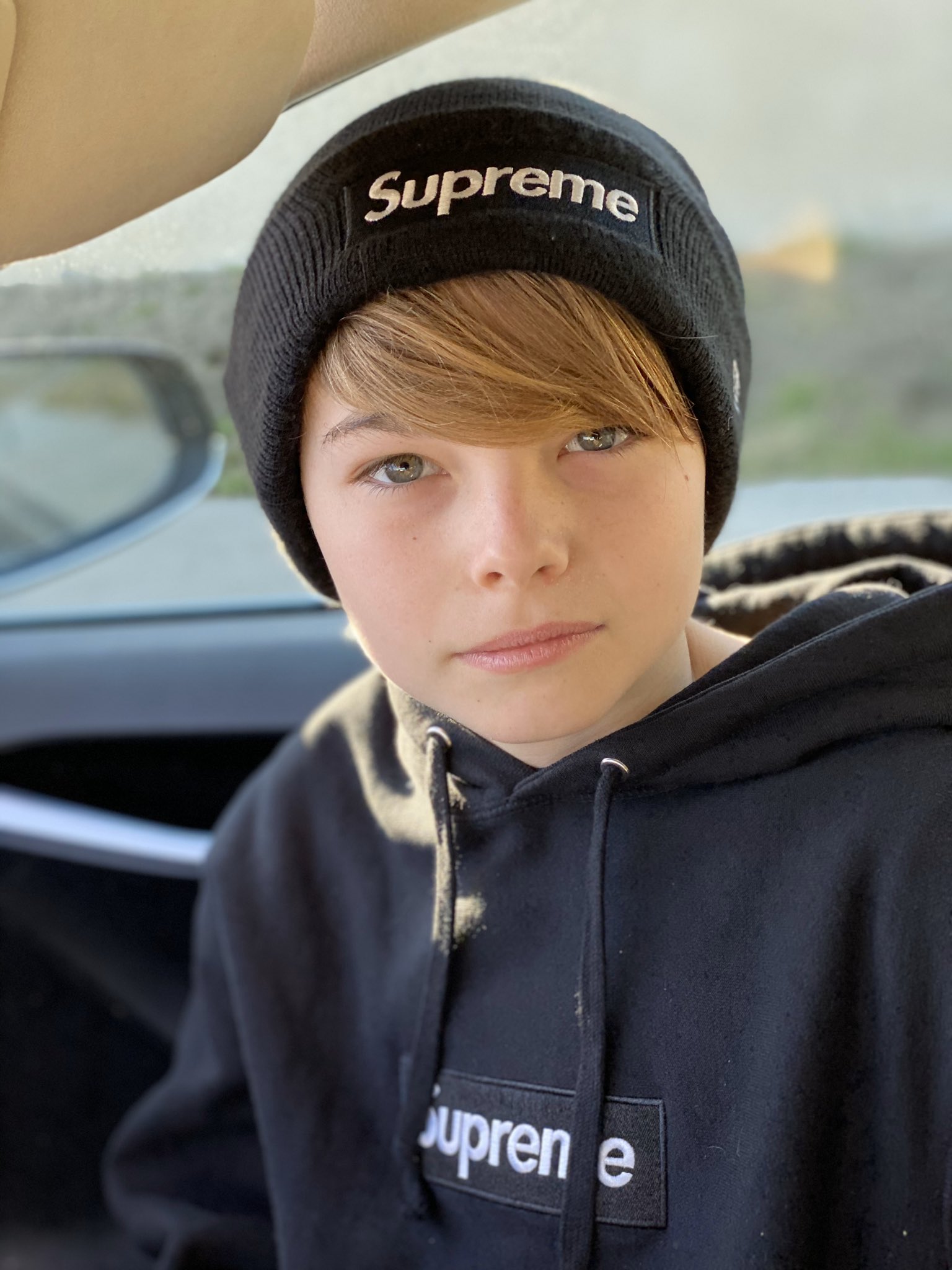 supreme beanie on head