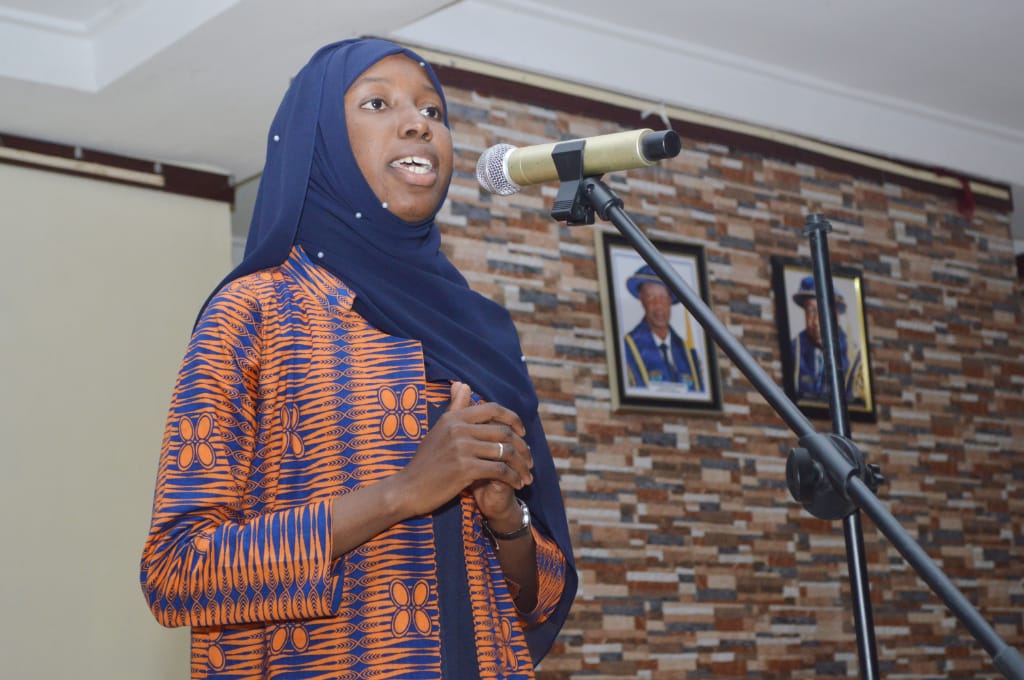 Bornolitsociety's tweet photo. #RelivingTheMoment

 @fzywa opened and closed the doors to "before" as the audience soared with her to the seventh heavens of poetry🔥
#PeaceUnbroken
#50ShadesOfBorno https://t.co/4gxuhkIkRd