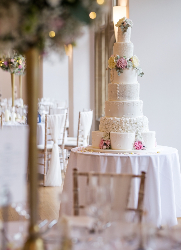 "I worked closely with Kerry from <a href="/angel_bakes/">Angel's Kitchen</a> to design the wedding cake of my dreams. It was a seven-tier masterpiece made up of 11 cakes, featuring edible lace, intricate piping, sugar flowers..." - Real Wedding bride Tia yourbristolsomerset.wedding/real-wedding/1… Photo: rebeccafaithphoto.com