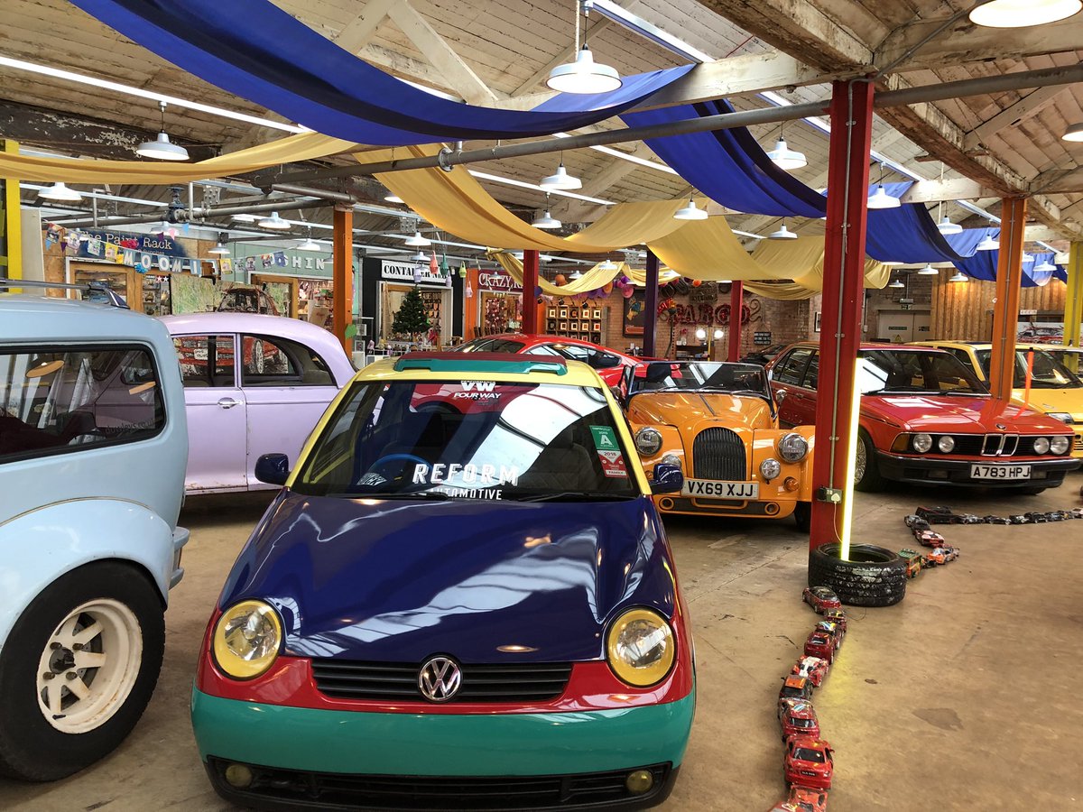 Lau_McMillan's tweet photo. .@FargoVillage looking super colourful today with exhibition curated by @Popbangcolour. Love the trail of cars along the floor! https://t.co/JmMjnGbMs6