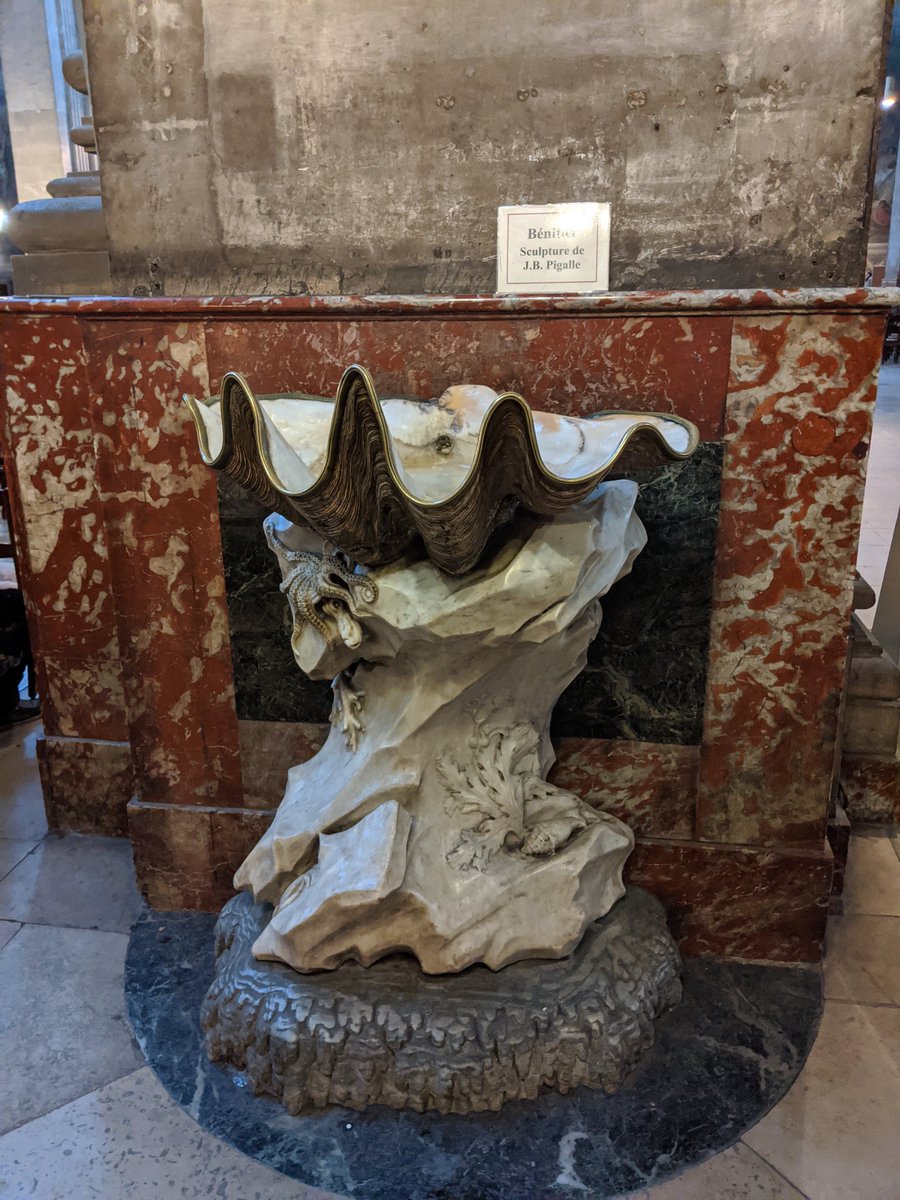 LavastreAntoine's tweet photo. Un des deux fameux bénitiers de Jean-Baptiste Pigalle à Saint-Sulpice. La coquille de taille magistrale est réelle. Elle fut offerte à François 1er par la République de Venise. https://t.co/YkZJ2OxXhi