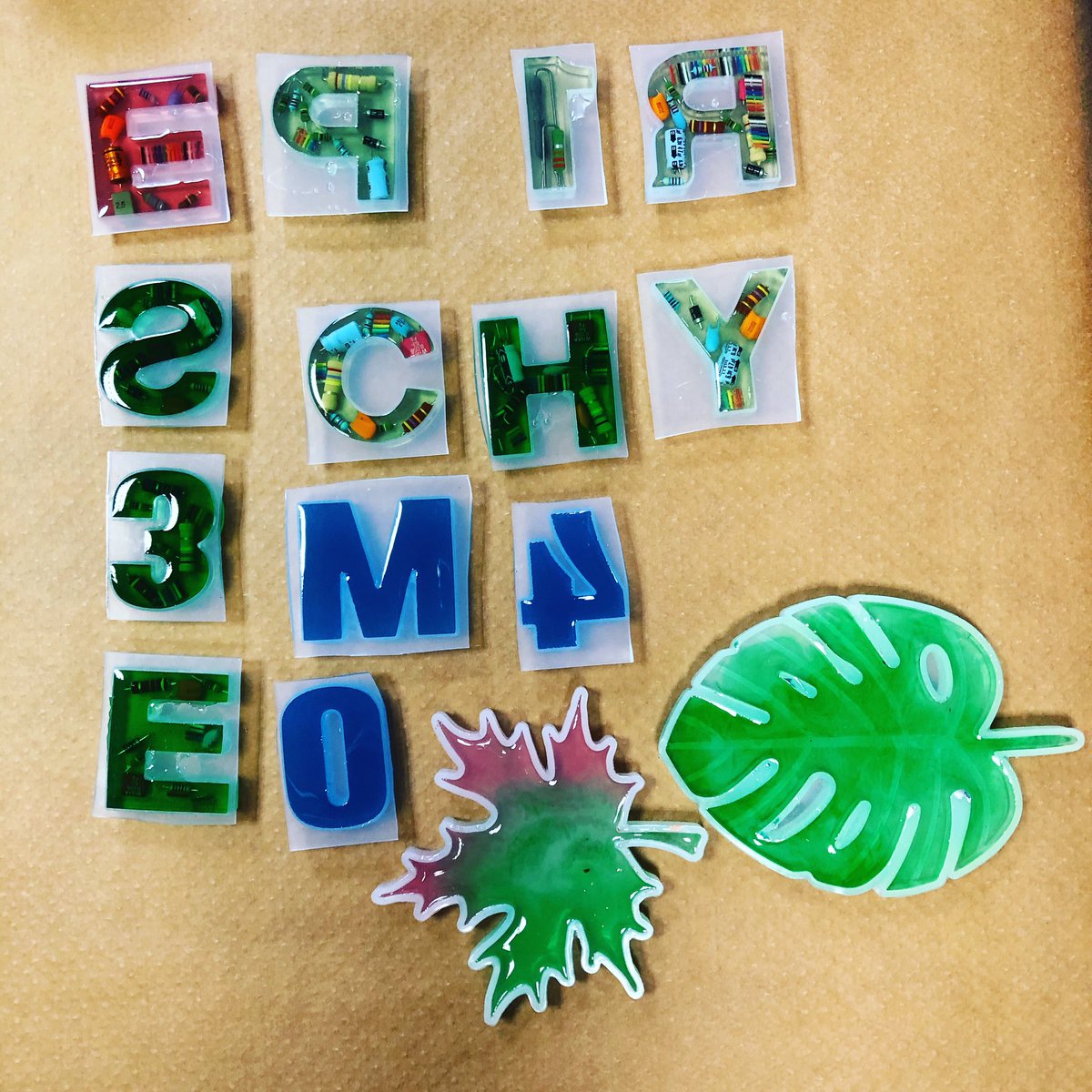 WillowKaya's tweet photo. Capacitors and resin go well together. Results from the workshop today @bytespeicher_ef #hackerspace https://t.co/mOIrPCKni3