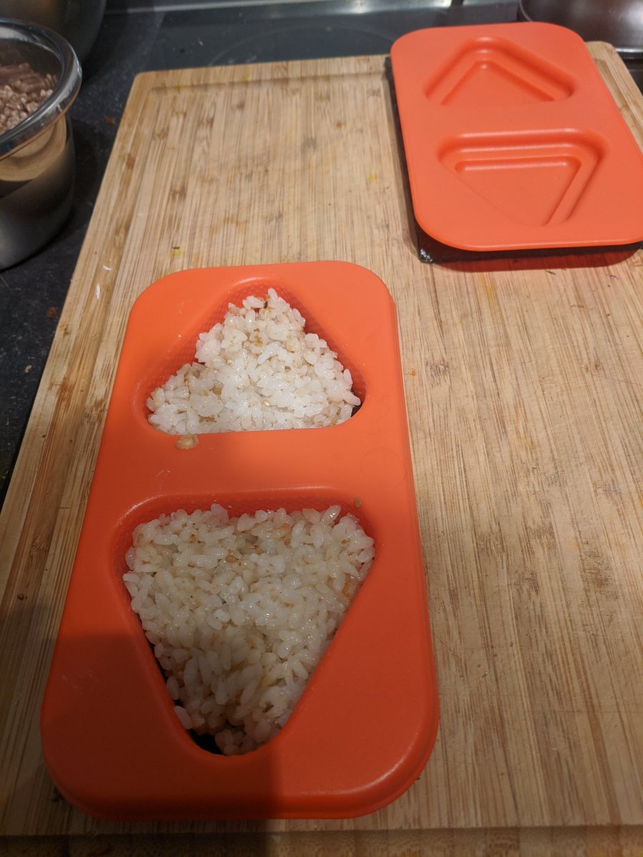 Rice set in an orange onigiri shaper