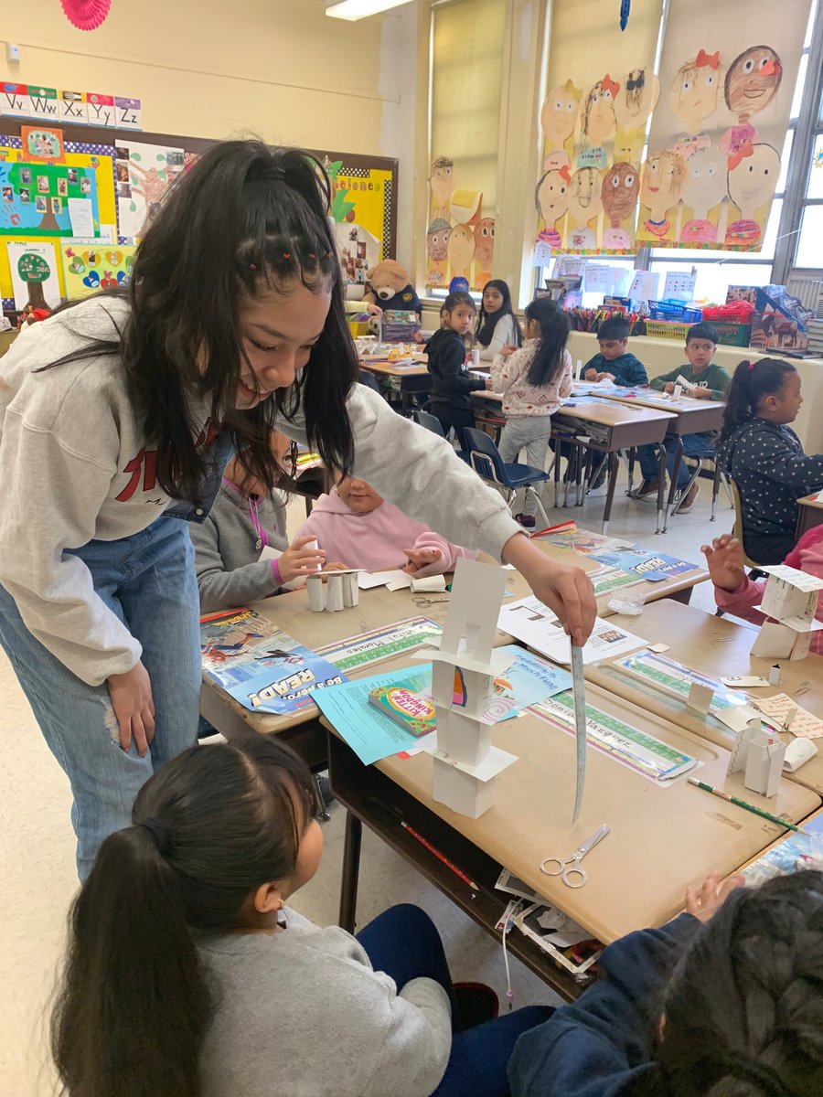 cherian_diana's tweet photo. STEMinists Keya Patel, Caroline Herrera &amp; Russell Oliviera 
@YonkersMHS with 2nd graders @EnricoFermi27 @YonkersSchools using repurposed paper to make towers, checking height &amp; strength-activity @MysterySci Principal Mr. Ametrano and Ms. Hope @yft860
supported them. https://t.co/8ASByfszrk