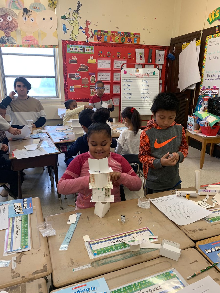 cherian_diana's tweet photo. STEMinists Keya Patel, Caroline Herrera &amp; Russell Oliviera 
@YonkersMHS with 2nd graders @EnricoFermi27 @YonkersSchools using repurposed paper to make towers, checking height &amp; strength-activity @MysterySci Principal Mr. Ametrano and Ms. Hope @yft860
supported them. https://t.co/8ASByfszrk