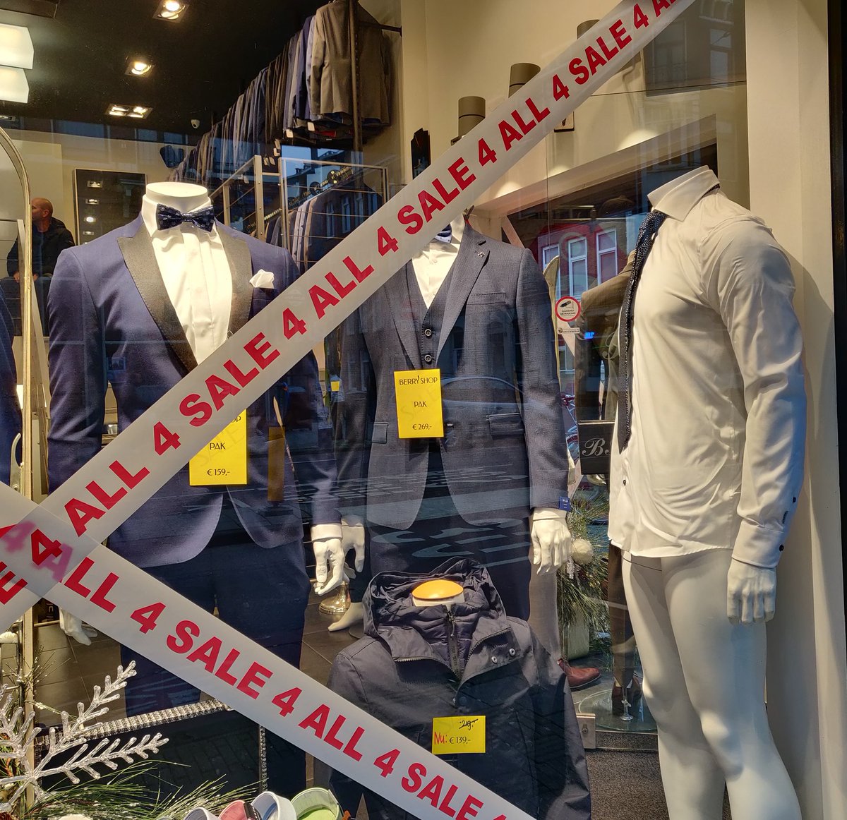 one of the mannequin has no pants on