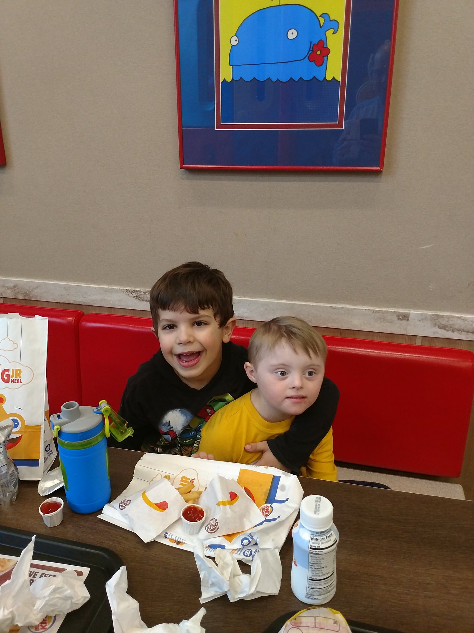 Andrew is having a belated birthday party. Happy to be with his best buddy Ryan. 