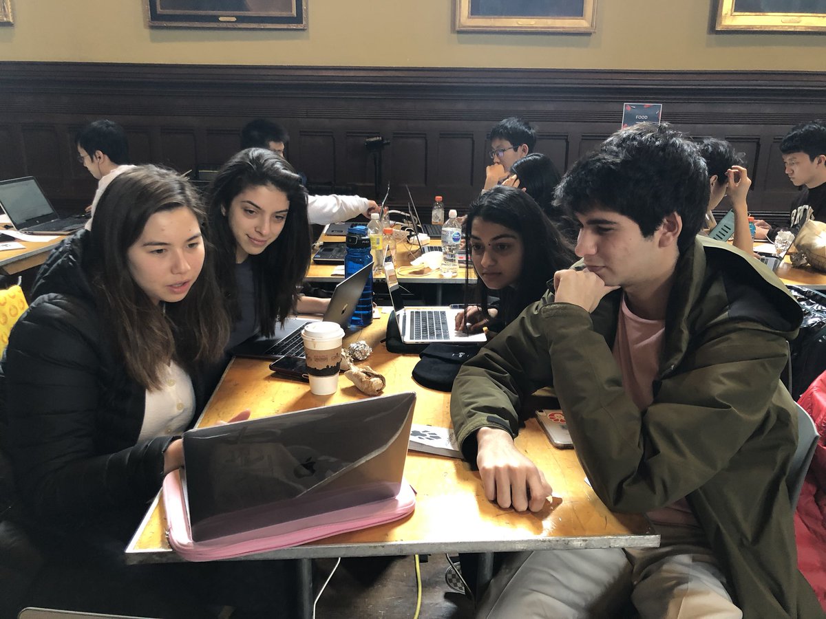 hackatbrown's tweet photo. Abigail Dichter ‘22, Danielle Benstock ‘23, Esha Lakhotia ‘23, Chotoo Amin ‘23 hard at work at today’s hackathon! Their idea: Fungazebo helps users share their schedules and find other people looking for a study buddy, lunch date, or party to go to. https://t.co/sTZPa4Xdr6