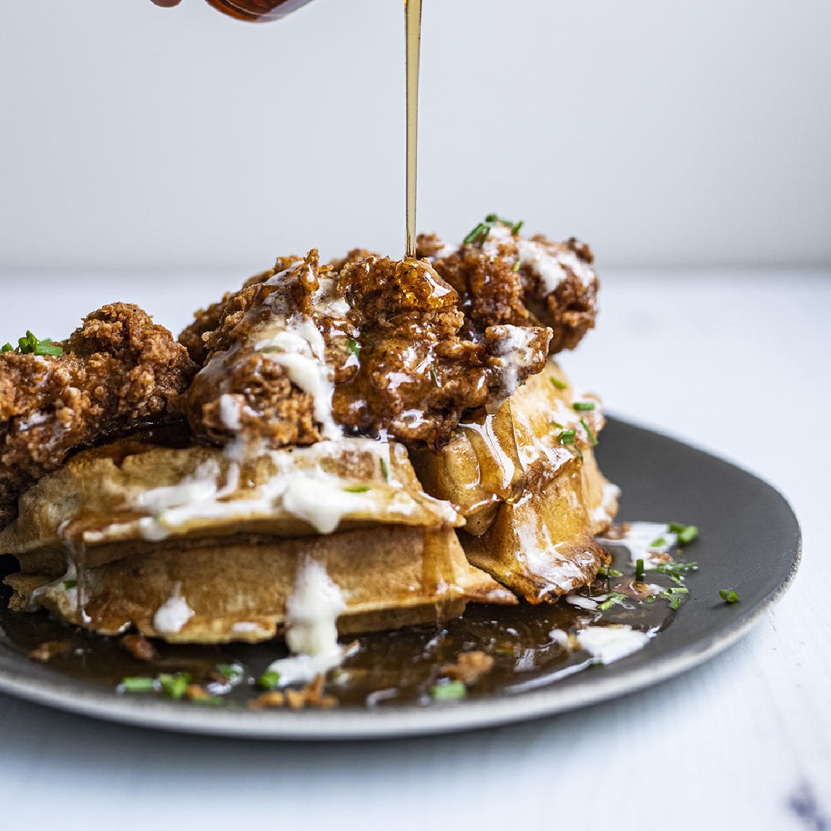 Heinens's tweet photo. We love breakfast a waffle lot, especially when fried chicken is involved 🥞🍗

If you're yet to indulge in the Chicken and Waffle craze, start with this recipe from @bonafideprovis that uses bone broth in the chicken and waffle batter: https://t.co/r4Mznz3Z3y https://t.co/zGIcWnhfnz
