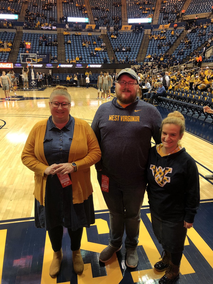 Our first Guest Coach of 2020 is Amanda Johnson of the <a href="/WVUBookstore/">WVU Bookstore</a> - Amanda (left, pictured here with family at today’s <a href="/WVUhoops/">WVU Men's Basketball</a> game) makes sure our student-athletes have the books they need each semester to succeed! Thanks for all you do Amanda!! 
#hailwv #WVUoneteam