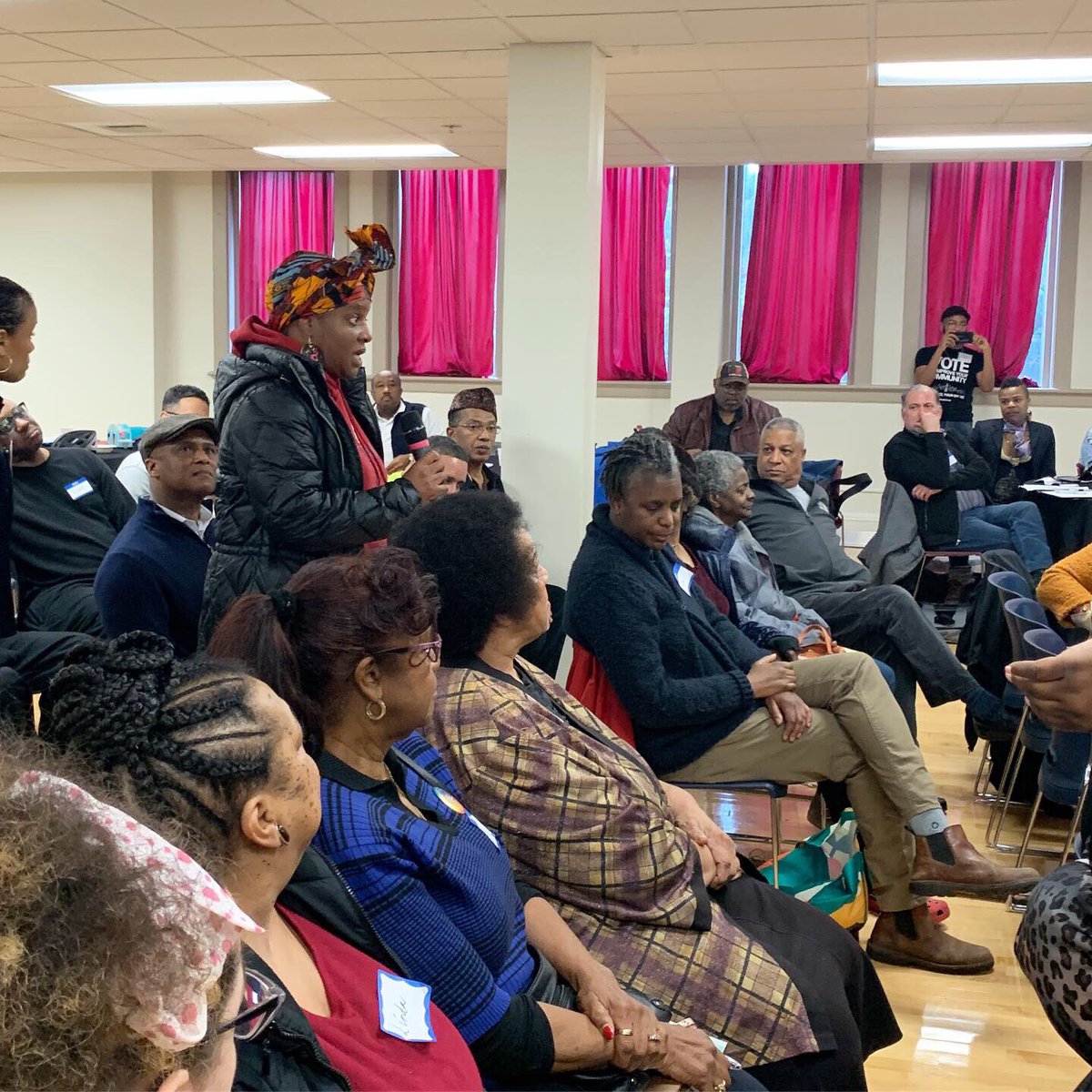 Woman speaking from audience