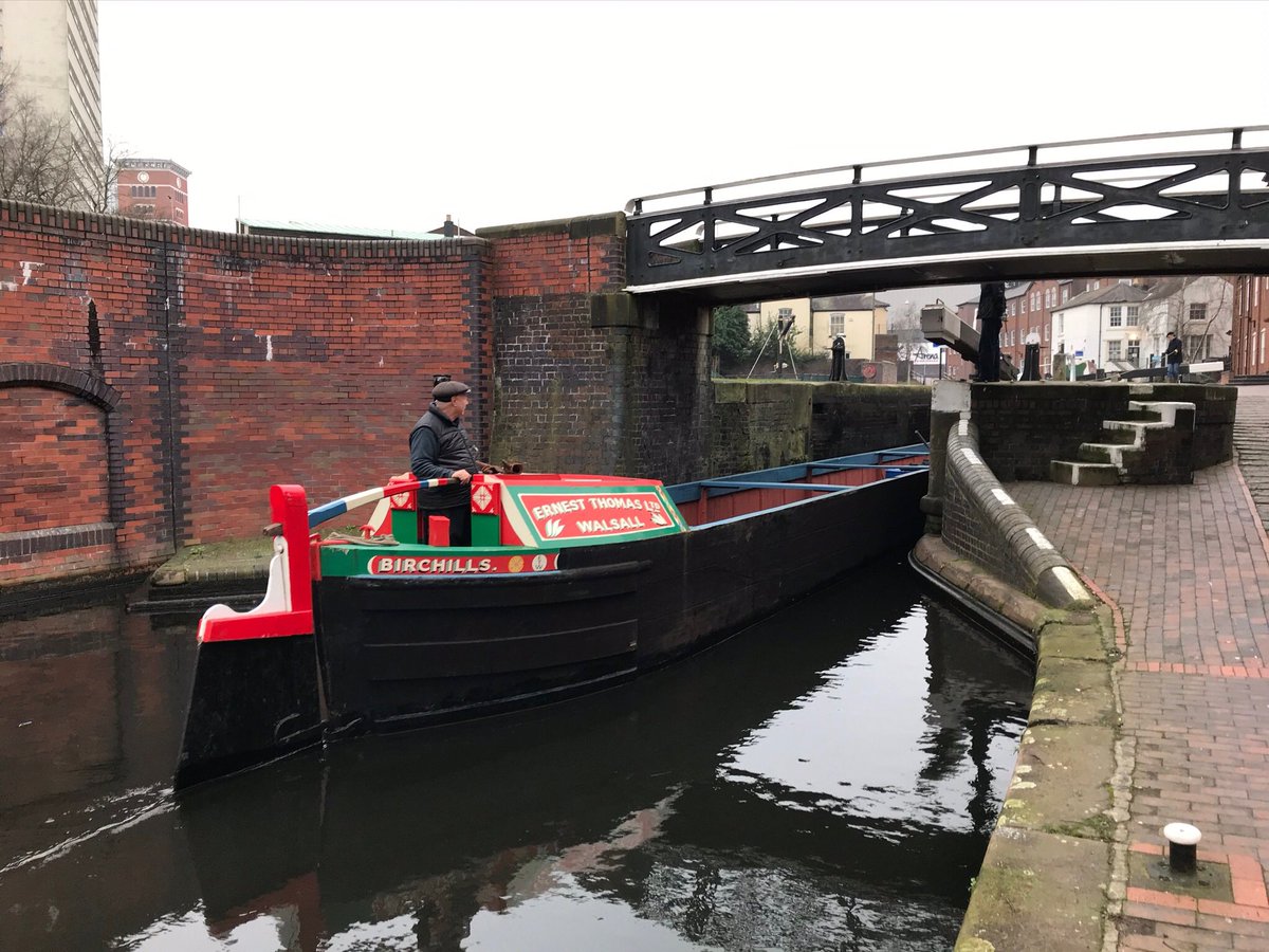Historic wooden boat Birchills enters the top lock of the Farmer’s Bridge on the way back to @BCLivingMuseum after repairs.