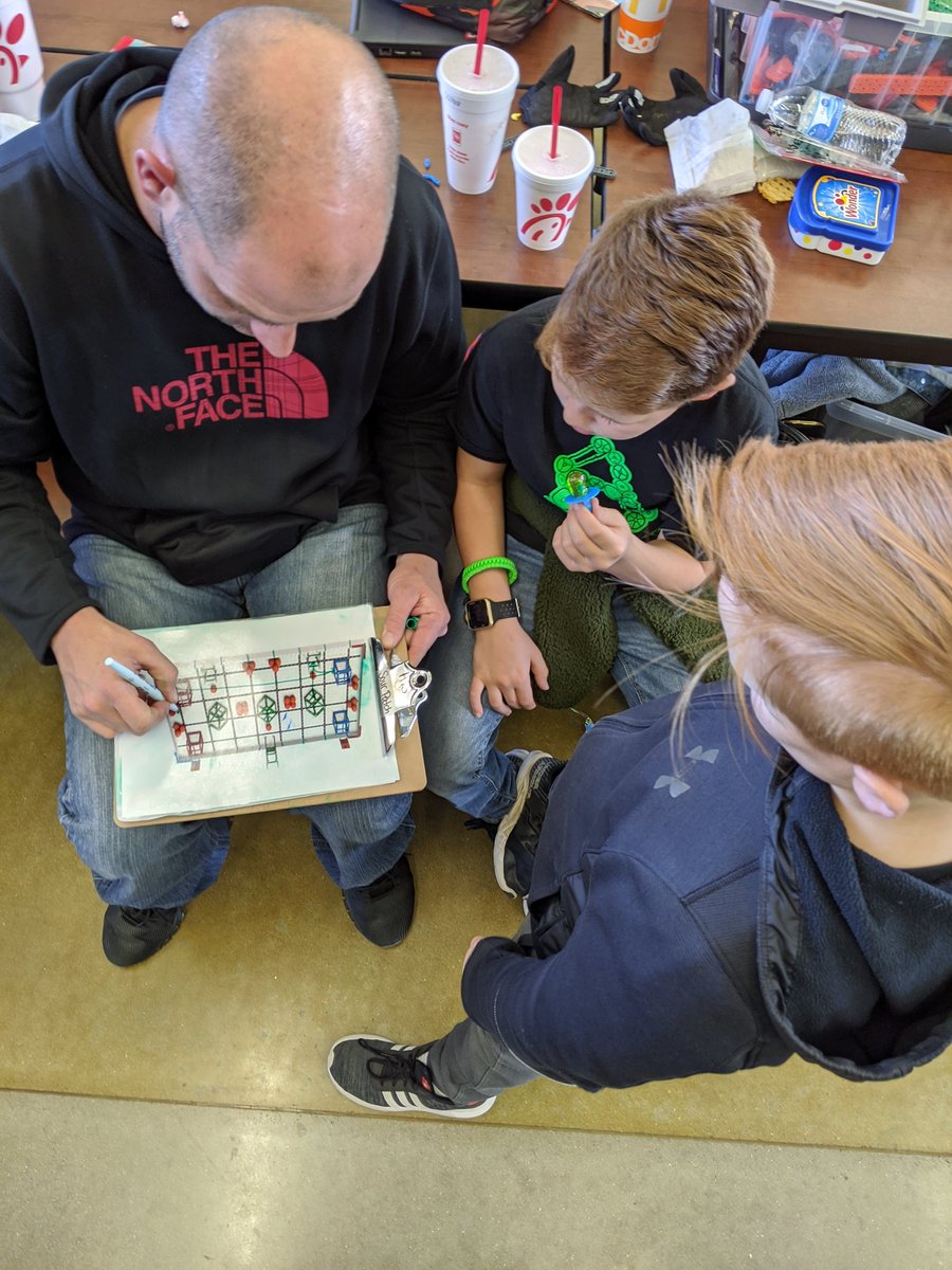 Alma_AISMatheny's tweet photo. Team 1220B made it to finals at our Bentonville VEXiq Competition! Talking strategy. Go Airedales!  @alma_ais https://t.co/0R38OA4AP2