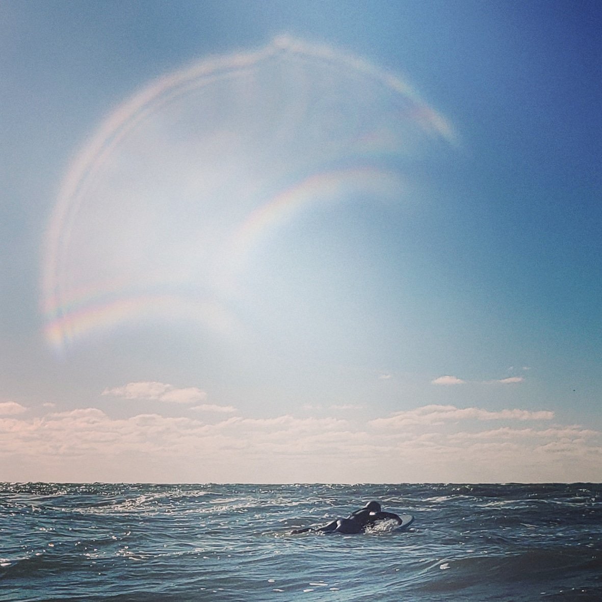 NomadicDispatch's tweet photo. It's either a water droplet on the waterproof cell phone case, or it's the Cloud Gods telling me to watch out for sharks. Either way, it was way too windy for much of a surf filled afternoon, but I loved getting out my new board. #torqsurfboards #Florida #beachdays #sharkcloud https://t.co/zUQmwQY212
