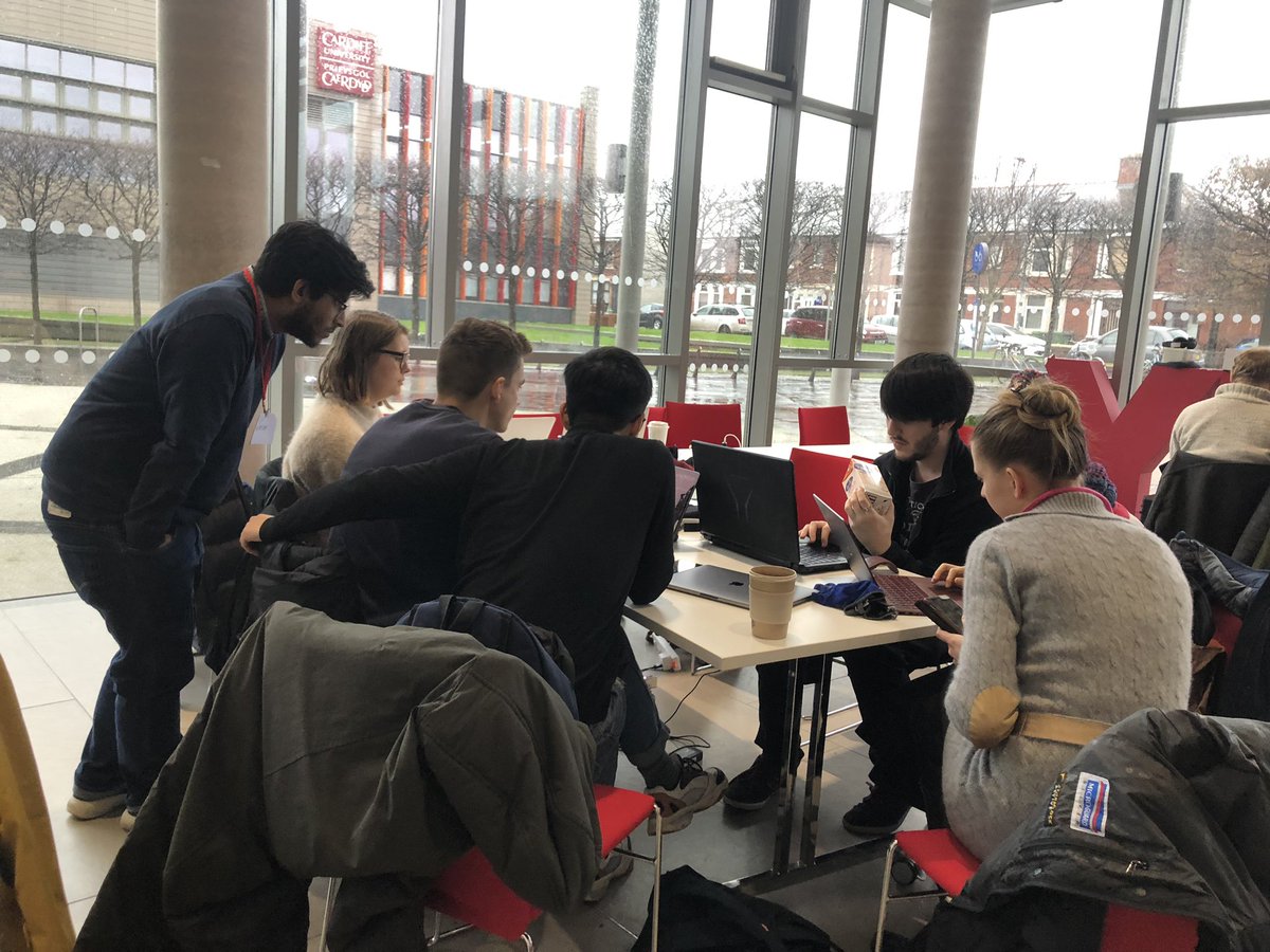 EdurneMG's tweet photo. Day 2 of #nhshd23 #NHSHackDay giving the last touches to 'Can I eat this?' Half of the group working on the barcode, the other half doing frontend https://t.co/YuszHtSDhS