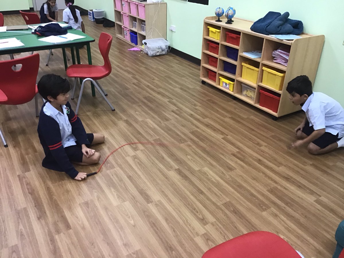 Making waves with a rope to see how going fast or slow changes them. Then making connections to sound waves #DIABscientist #DIABlearningisfun