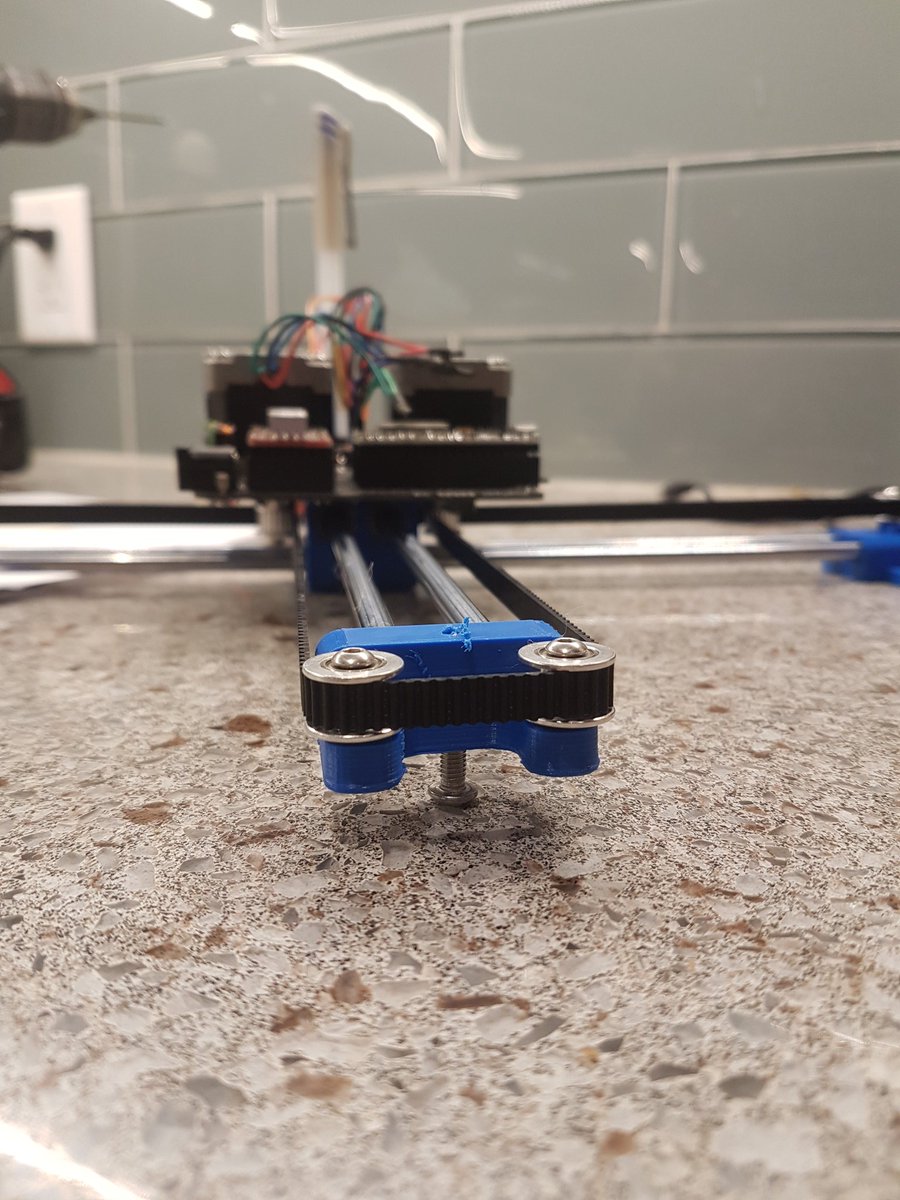 dhampgonsalves's tweet photo. Did some tests supersizing my #midtbot (quarter for scale). All I did was add a screw to allow the y axis to skid around and the print results don't seem noticeably worse so far. https://t.co/vzTlmf8upl