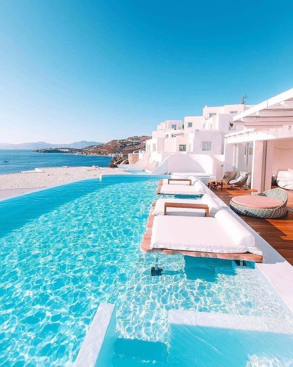 thedoggich's tweet photo. Who you talking with you to this beautiful resort in Mykonos, Greece?? (Follow Doggich for daily content of the most beautiful #hotels and resorts in the world) https://t.co/rMyS04RLbs
