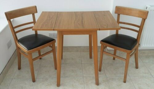 KitchenVintage's tweet photo. #vintage Retro Drop Leaf #formica Top Table 2 Wooden Black Vinyl Chairs Vgc https://t.co/FMXhbIJEPz https://t.co/YuIQfzF2iE