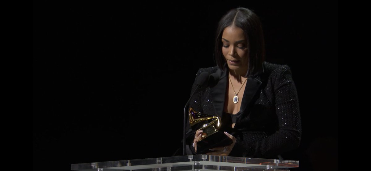 MrMouthAlmighty's tweet photo. Lauren London accepting Nipsey’s Grammy for Best Rap Performance #GRAMMYs https://t.co/qhUKhYqEux