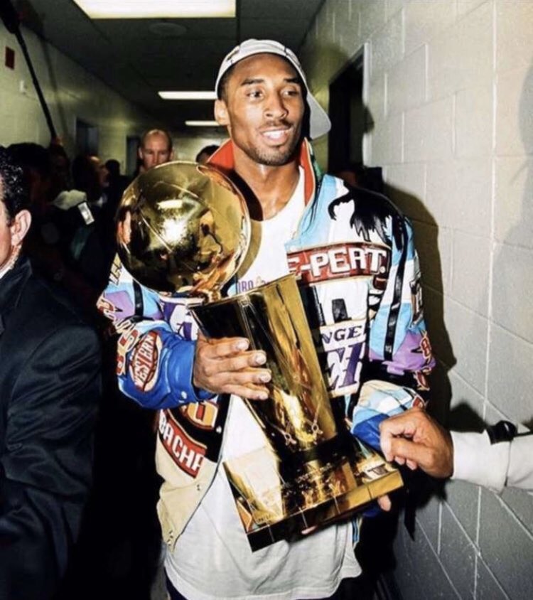kobe holding trophy shirt