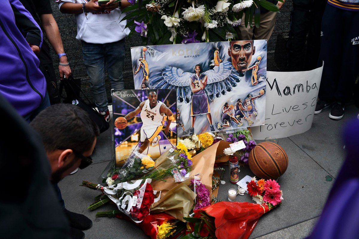 ABSCBNNews's tweet photo. LOOK: Fans mourn the loss of NBA legend Kobe Bryant outside of the Staples Center in Los Angeles. Harrison Hill-USA Today via Reuters #RIPMamba https://t.co/h0FTSecoUX