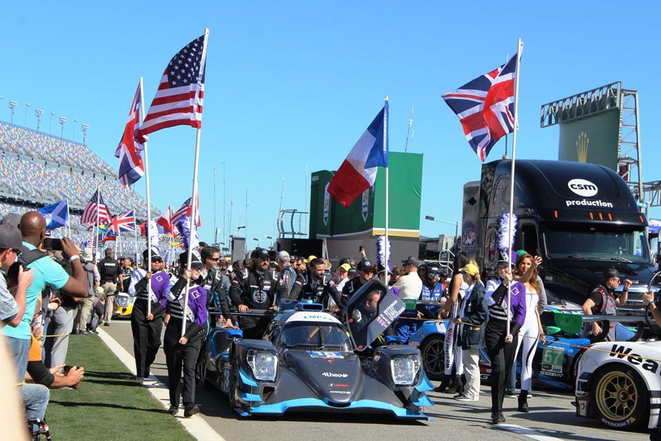GHSBandandGuard's tweet photo. Yesterday the Gainesville High School Band and Guard had the honor and privilege of leading the parade of cars for the Rolex 24 at Daytona International Speedway. We are proud of these kids! #ghsband #marchingband #rolex24 #daytonainternationalspeedway #nyoom https://t.co/lJQzt7mrJV