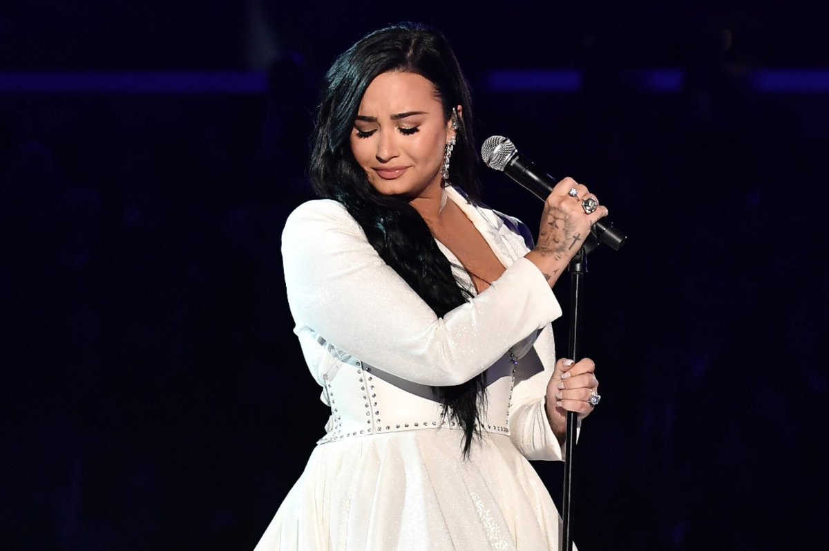 RollingStone's tweet image. Demi Lovato premiered a new song, "Anyone," in her first live performance in two years at the #GRAMMYs rol.st/3aGCYrH