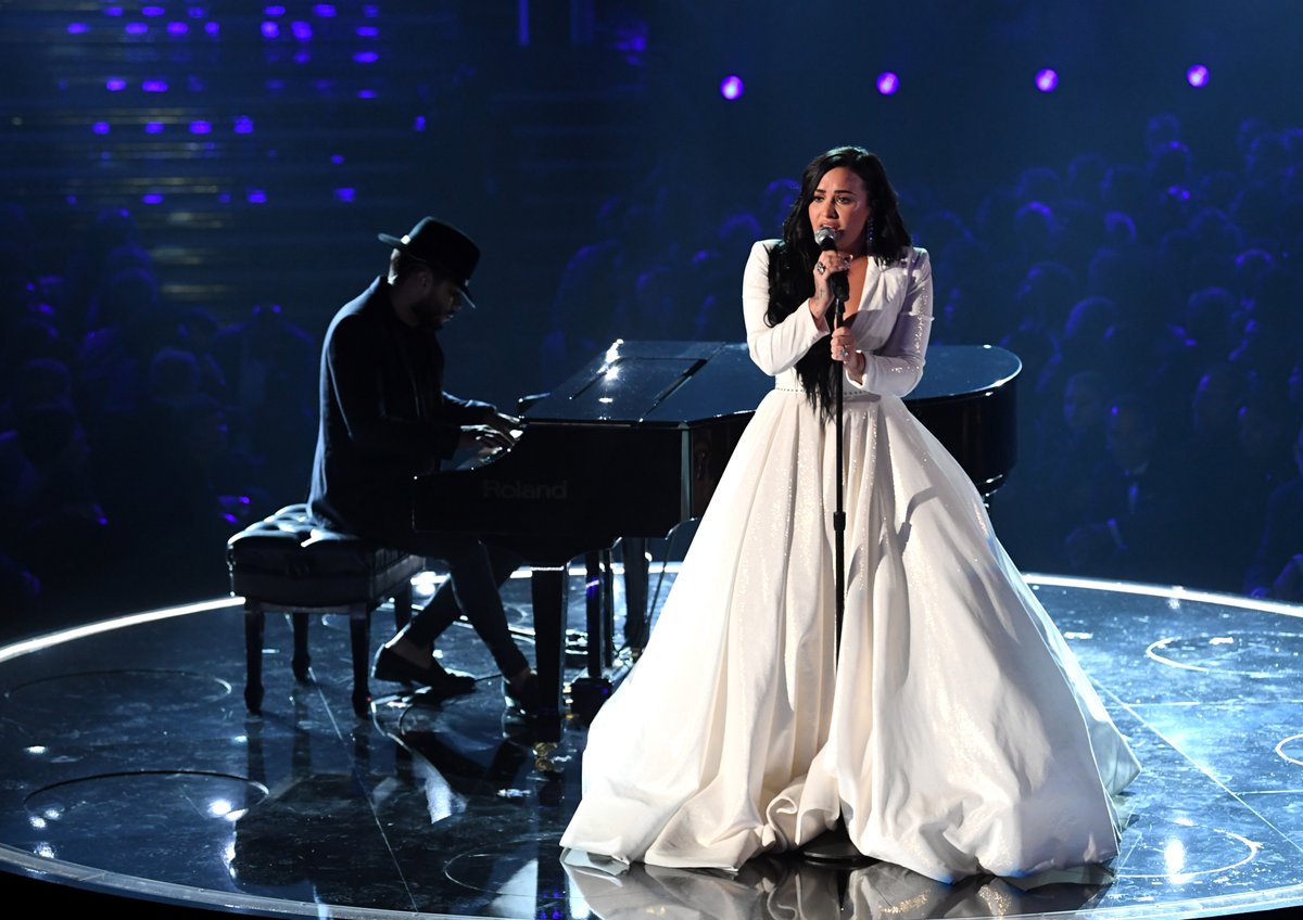 LiveNation's tweet image. Demi Lovato's powerful #GRAMMYS performance left us speechless. A well-deserved standing ovation 👏👏👏