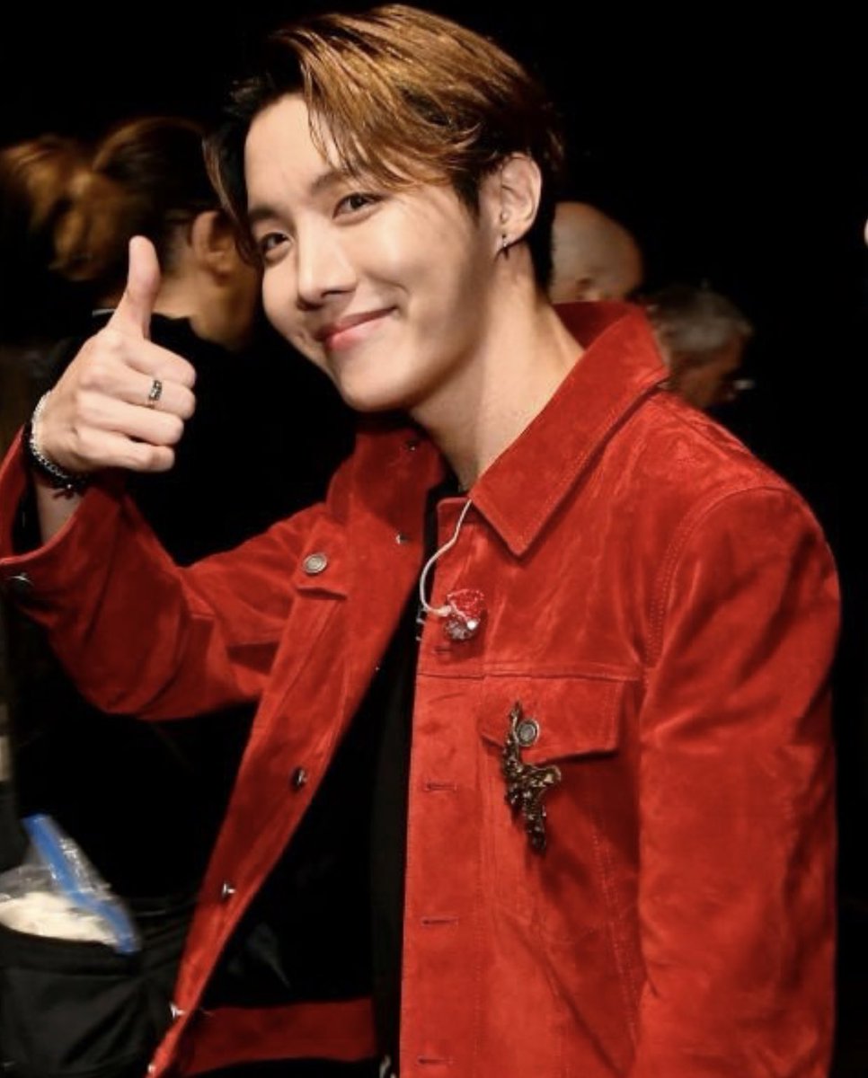 Hope World Daily ¹¹² 🌏 on "Did the 'red jacket guy' steal your heart? He sure stole ours! 😉 Reply with “#JHOPE is my red” if he did and don't forget