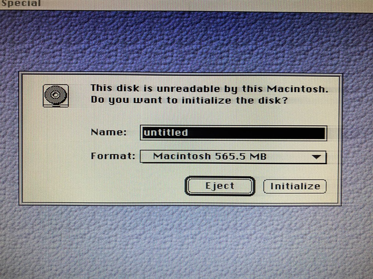 Mac OS dialogue box: “(CD-ROM icon) This disk is unreadable by this Macintosh. Do you want to initialize the disk? Name: untitled; Format: Macintosh 565.5 MB. [Eject] [Initialize]”