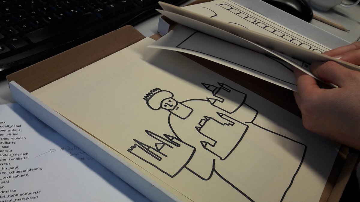 Some tactile plates, showing details of pictures and documents in the Stadtmuseum Trier.