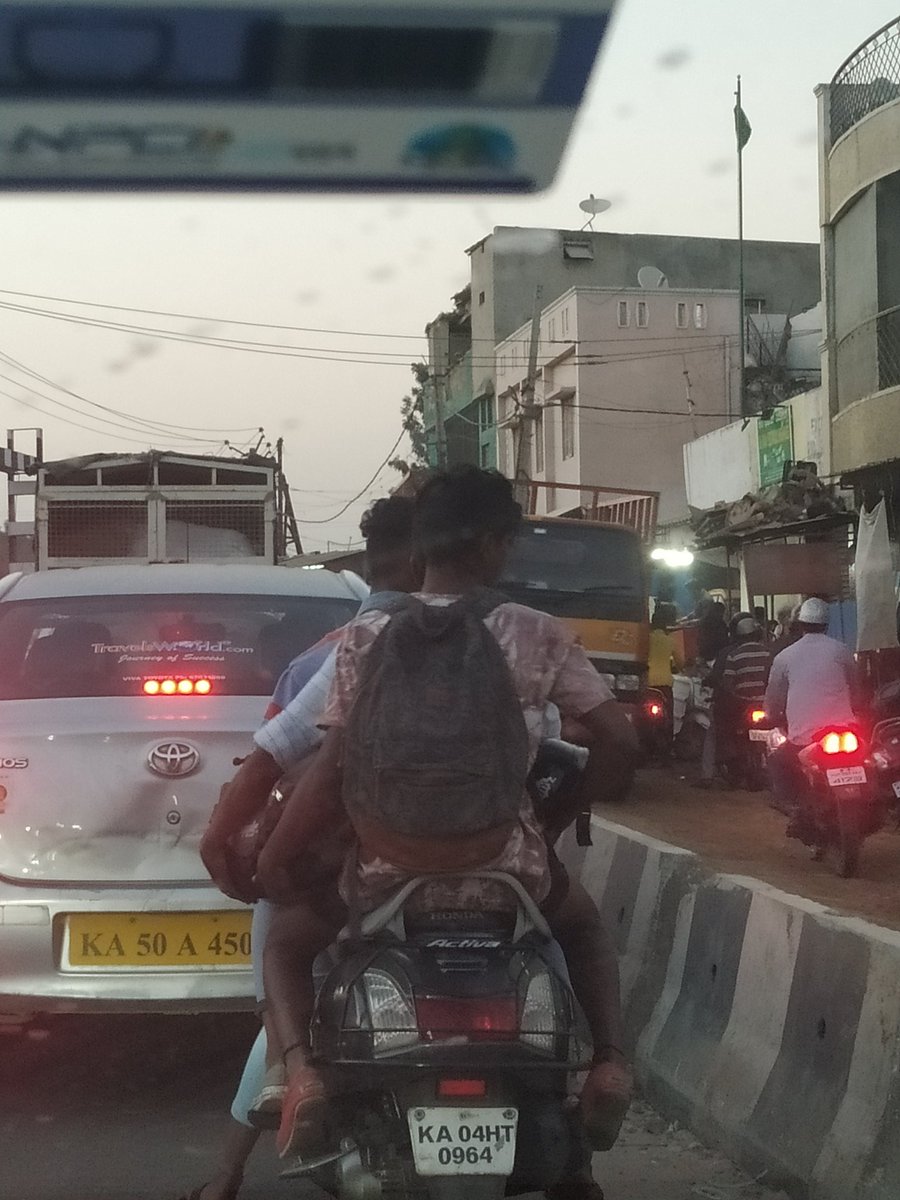 swami_ks77's tweet photo. Helmet less driving and triples near shampura Railway crossing today at 6.20 pm @blrcitytraffic @trafficwatchblr https://t.co/xLyulju4Ak