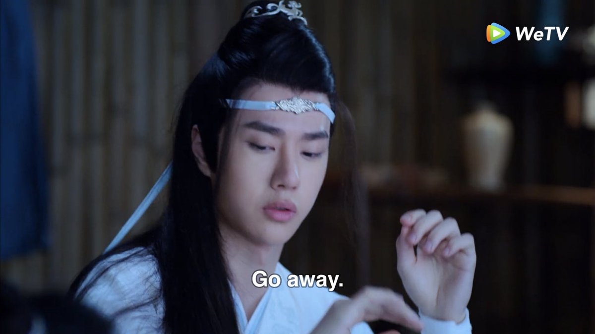 the first time it had actually been crooked and wwx was trying to straighten it and lwj scolded him. the second time,,,, it was fine and wwx made it crooked and lwj let him.