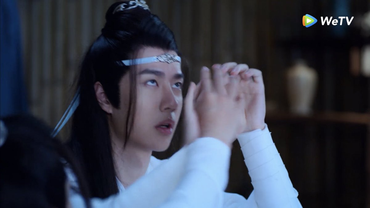 the first time it had actually been crooked and wwx was trying to straighten it and lwj scolded him. the second time,,,, it was fine and wwx made it crooked and lwj let him.