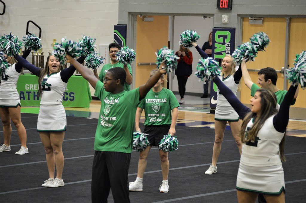 cheer_lrhs's tweet photo. Sharing the mat with our Heart of the Pride was the best way to start our competition day 💚💙 
#PrideLove #SPED @leesvilleroadhs https://t.co/PVzbEyParm