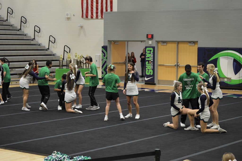 cheer_lrhs's tweet photo. Sharing the mat with our Heart of the Pride was the best way to start our competition day 💚💙 
#PrideLove #SPED @leesvilleroadhs https://t.co/PVzbEyParm