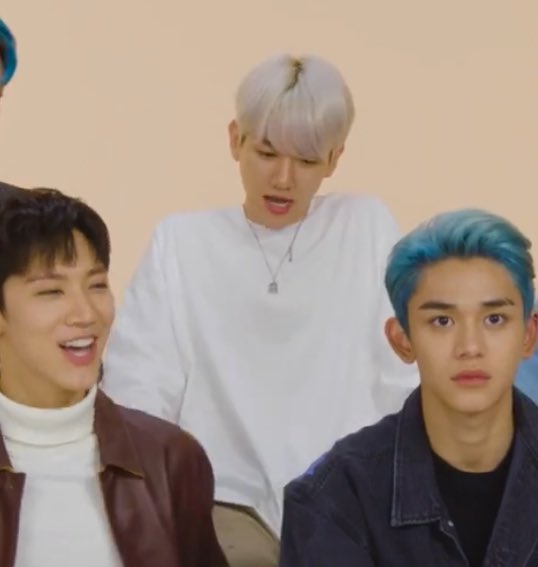 baekhyun dancing to danger the whole time while taemin talked about it in their teen vogue playlist vid