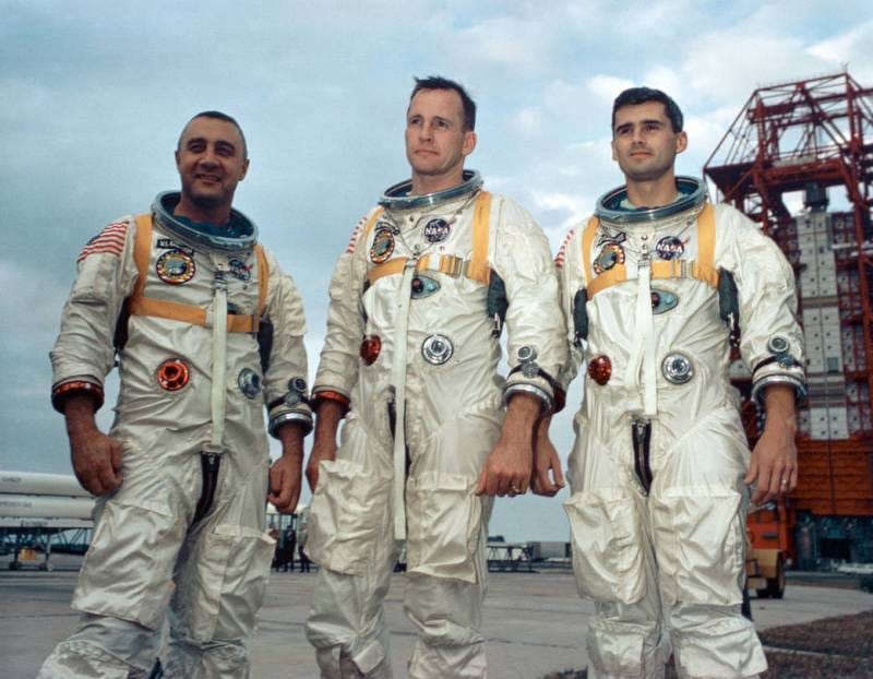 Image: Lt. Col. Virgil I. Grissom, a veteran of Mercury and Gemini missions; Lt. Col. Edward H. White, the astronaut who had performed the first United States extravehicular activity during the Gemini program; and Roger B. Chaffee, an astronaut preparing for his first space flight. Photographed at Cape Kennedy’s Launch Complex 34. Photo by NASA.

