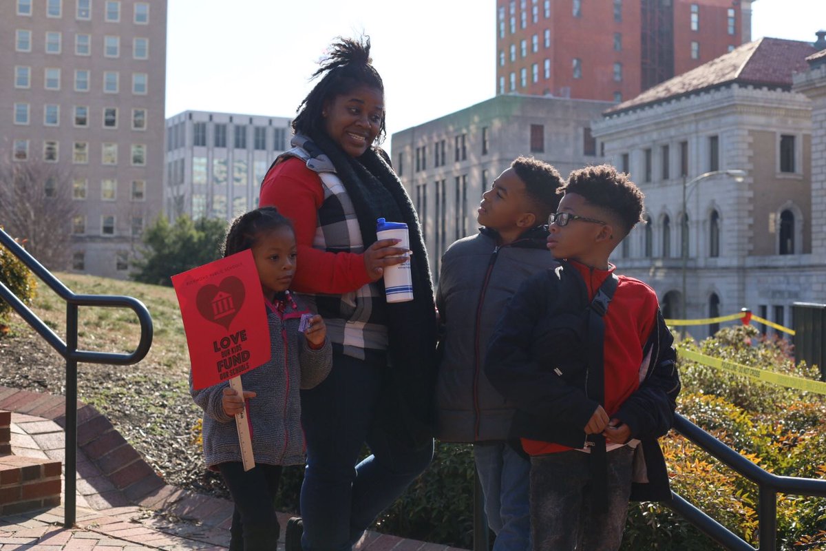Teachers, parents &amp; students are gathering at the Capitol for VEA Lobby Day, an annual push for school funding by <a href="/VEA4Kids/">Virginia Education Association</a>.
In a callback to 2019 #RedForEd march and rally, many are wearing red, and they're holding red signs asking for more school funding. 📷Louise Keeton/VPM