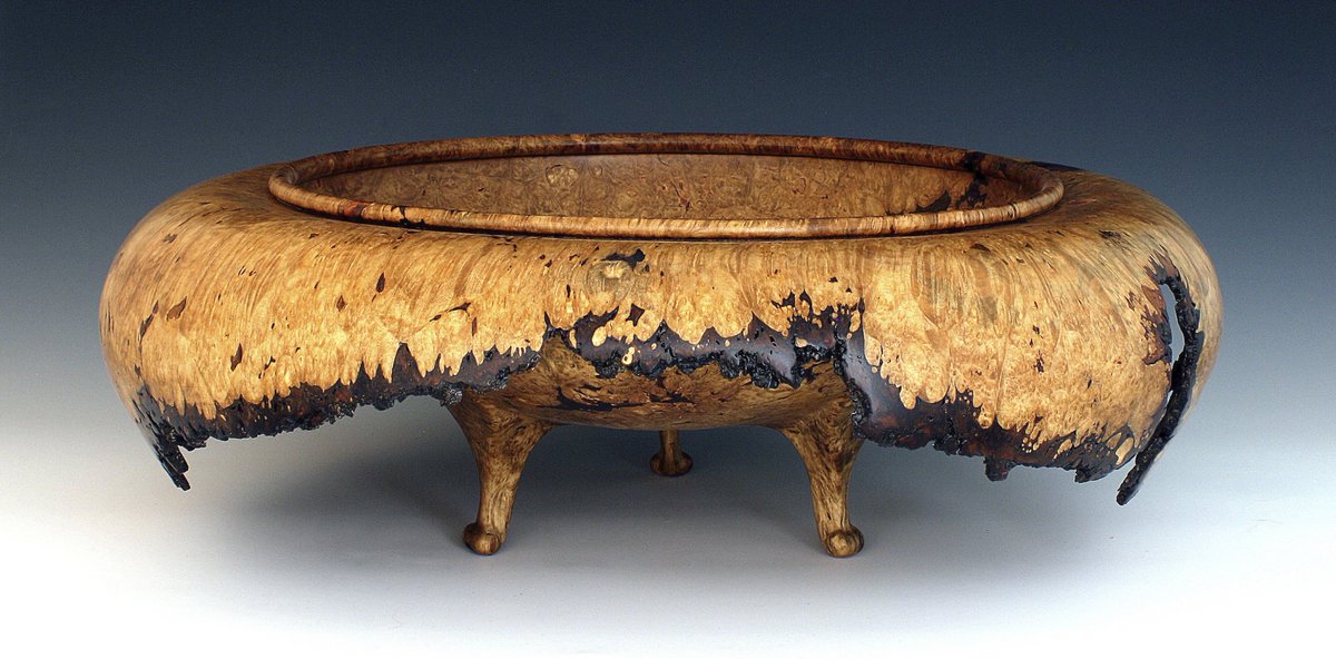 Member Gallery Turning of the Week:
"Cascades" by Chris Ramsey

Big leaf maple burl 3 leg turned and carved bowl. 24" W x 10" H.