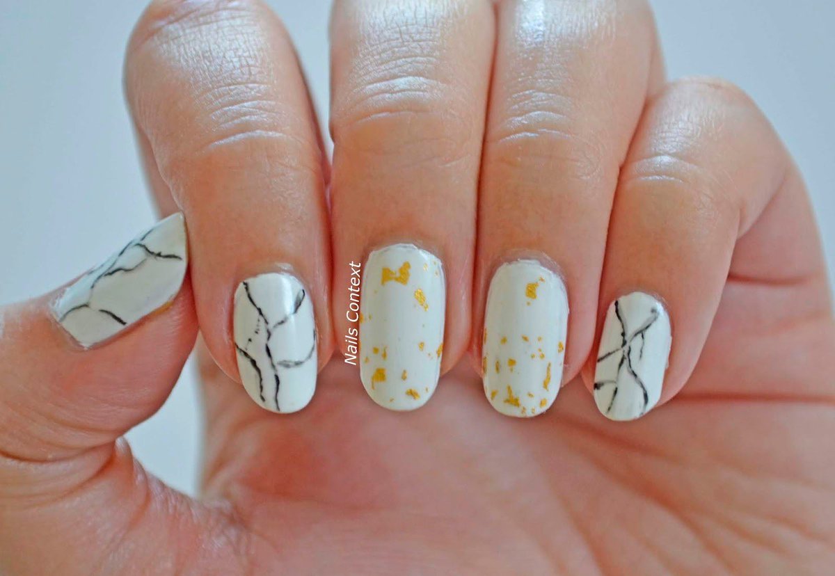 sony_foodrange's tweet photo. #marble effect nails https://t.co/kZy95CqFBr #notd #nails #nailpro #zoyanailpolish #goldflakes #nailscontext #nailitdaily #nailpro #nailprodigy #beautyblogger #nailsofinstagram https://t.co/GFNzccaJle