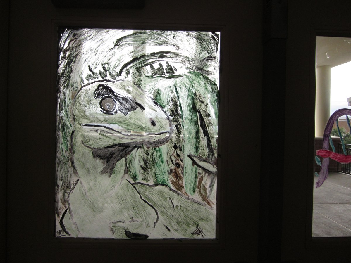 check out the student created Jurassic Park themed window art #UHSLiteracy #flcelebratesliteracy #VCSCLW2020